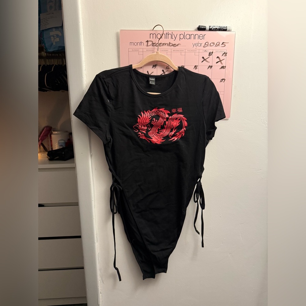 SHEIN Black Bodysuit with Red Dragon Graphic. High Leg Tie Design